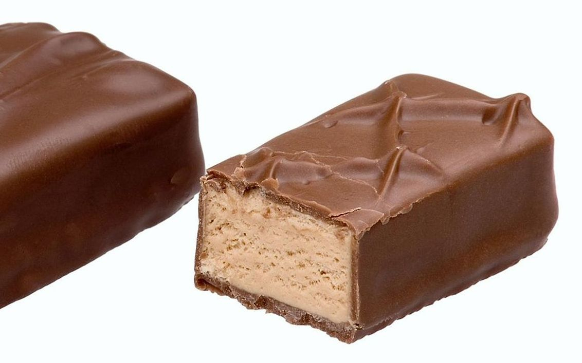 A Belgian chocolate bar with a glossy, snapped edge